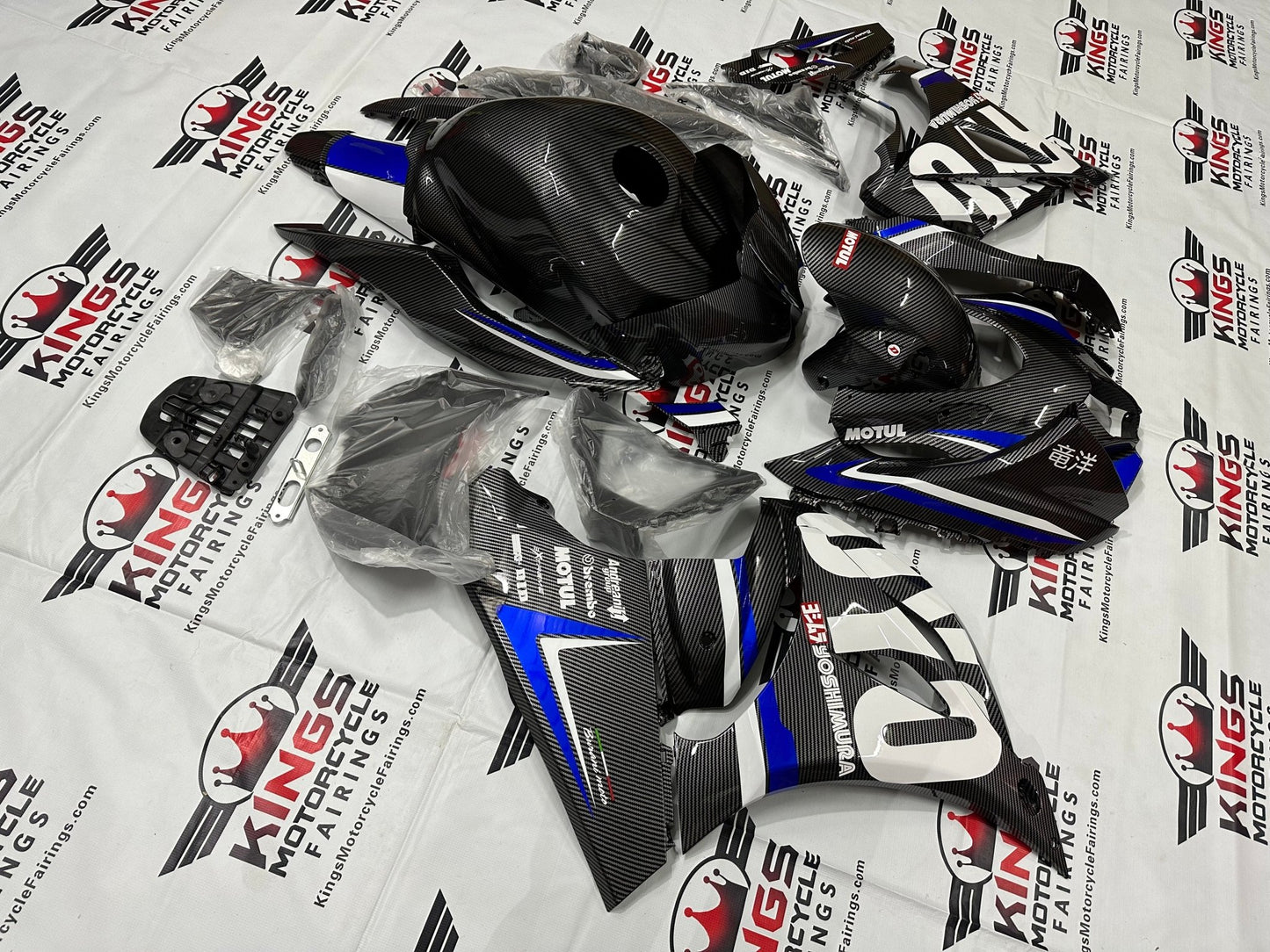 Suzuki GSXR1000 Fairings (2017-2025) Faux Carbon Fiber, Blue, White Stripe from KingsMotorcycleFairings.com