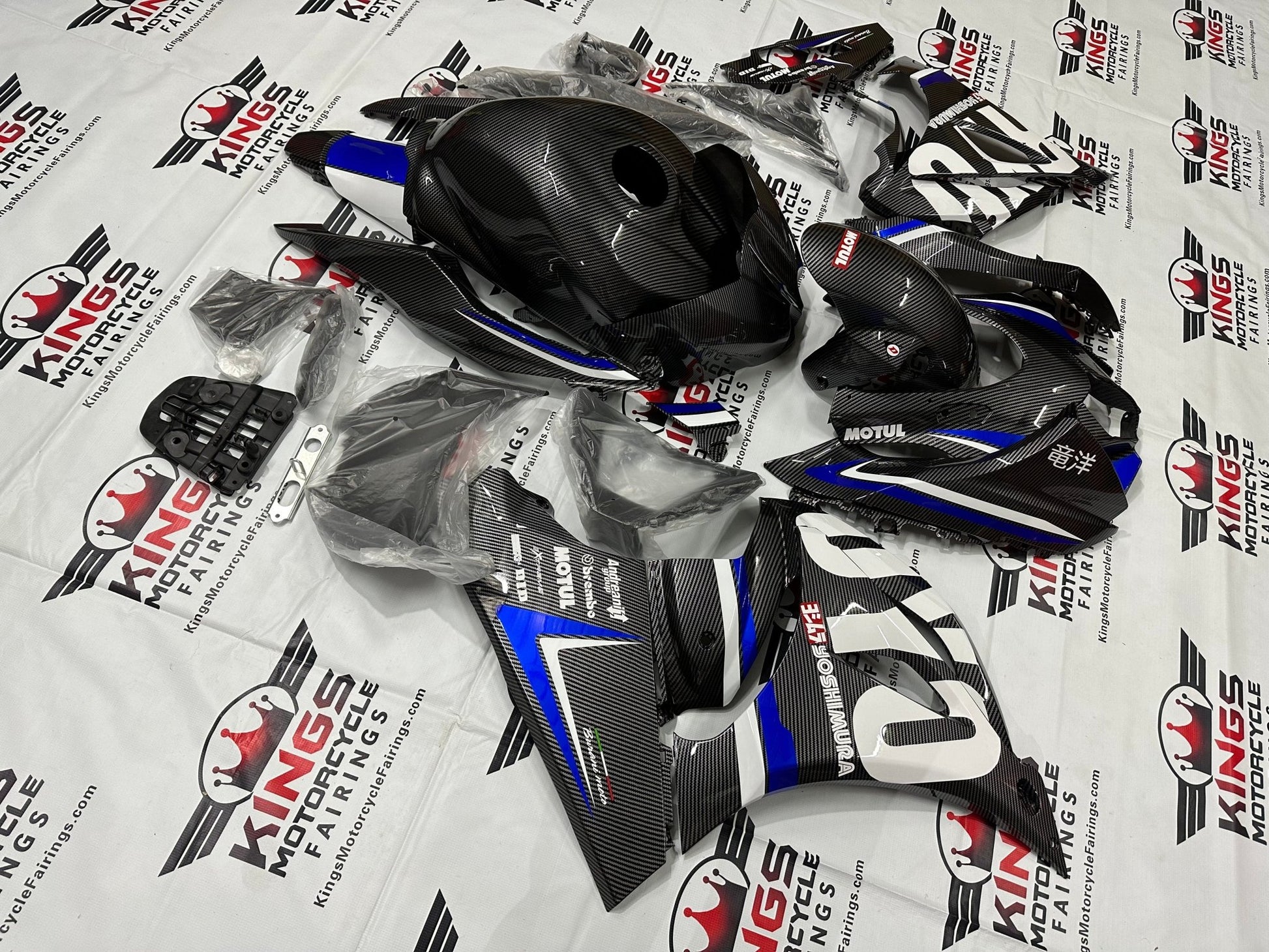 Suzuki GSXR1000 Fairings (2017-2025) Faux Carbon Fiber, Blue, White Stripe from KingsMotorcycleFairings.com