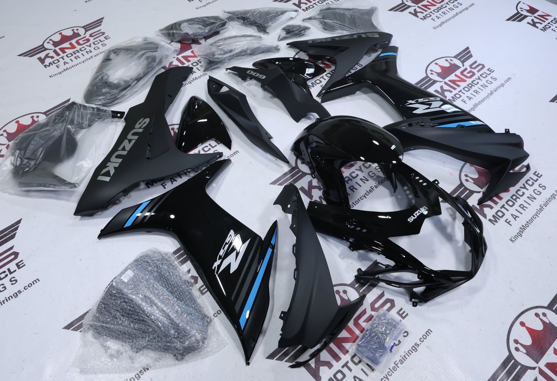 Suzuki GSXR600 Fairings (2011-2024) Black, Matte Black, Blue Stripe from KingsMotorcycleFairings.com