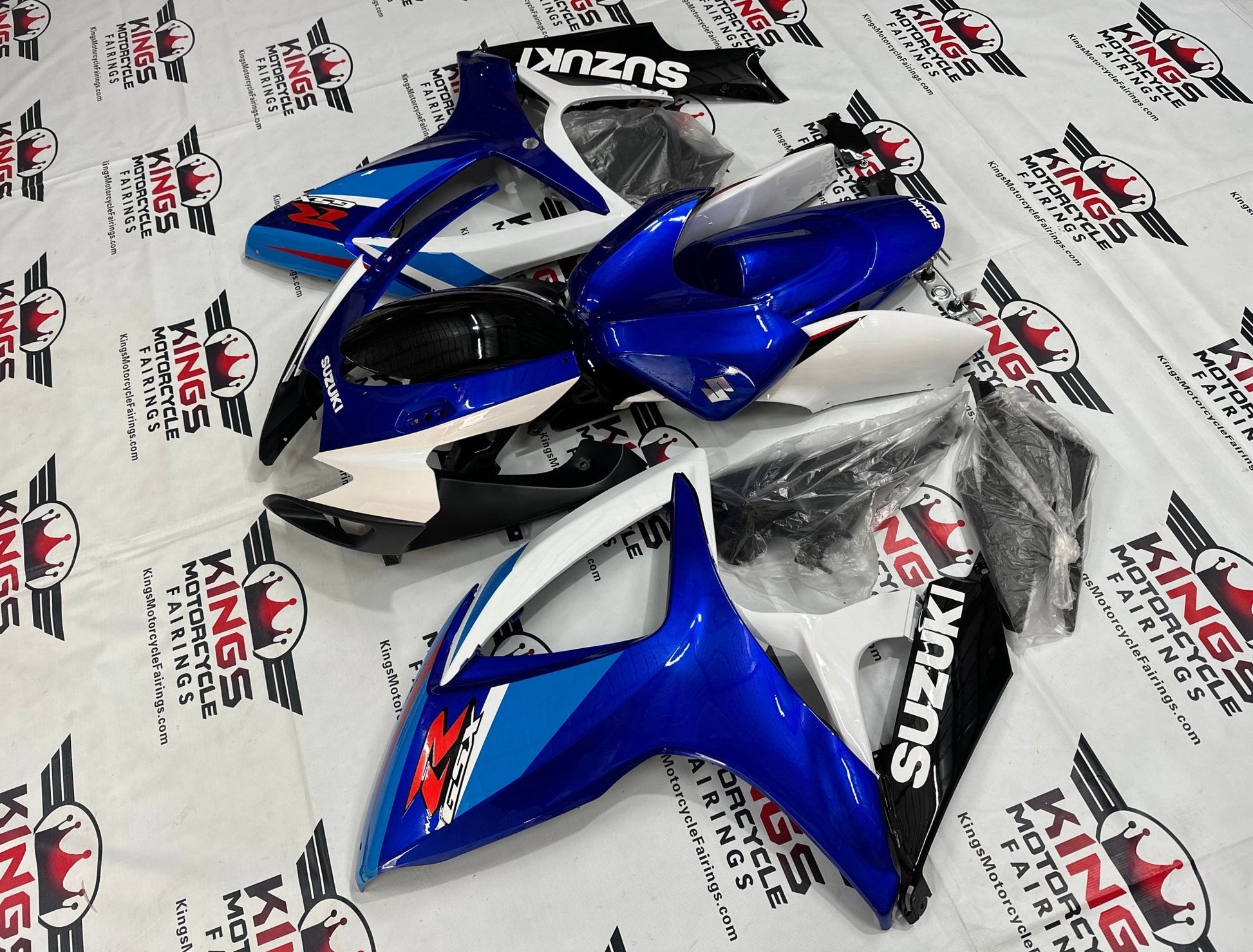 Suzuki GSXR750 Fairings (2006-2007) Blue, White, Black, Red Stripe from KingsMotorcycleFairings.com