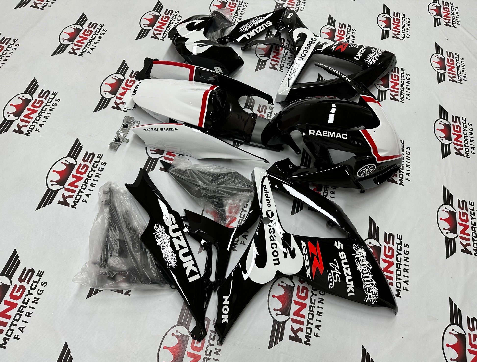 Suzuki GSXR750 Race Track Fairings (2006-2007) Black, White, Red from KingsMotorcycleFairings.com