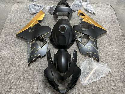 Suzuki GSXR600 Fairings (2004-2005) Flat Black, Gold Tribal at KingsMotorcycleFairings.com