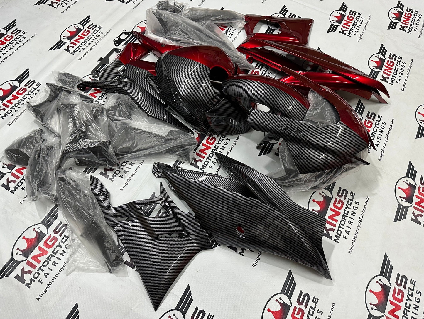 Yamaha R3 Fairings (2022-2024) Faux Carbon Fiber, Candy Red Split from KingsMotorcycleFairings.com
