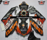 Matte Black, Orange, White and Red Rossi Fairing Kit for a 2004 and 2005 Honda CBR1000RR motorcycle