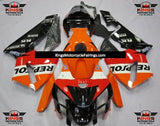Black, Orange and Red Repsol Fairing Kit for a 2005 and 2006 Honda CBR600RR motorcycle