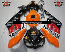 Black, Orange, White and Red Repsol Fairing Kit for a 2004 and 2005 Honda CBR1000RR motorcycle