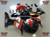 Black, Red, White and Orange Fairing Kit for a 2006 & 2007 Honda CBR1000RR motorcycle