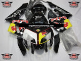 Black, Red, Yellow and White RedBull Fairing Kit for a 2005 and 2006 Honda CBR600RR motorcycle
