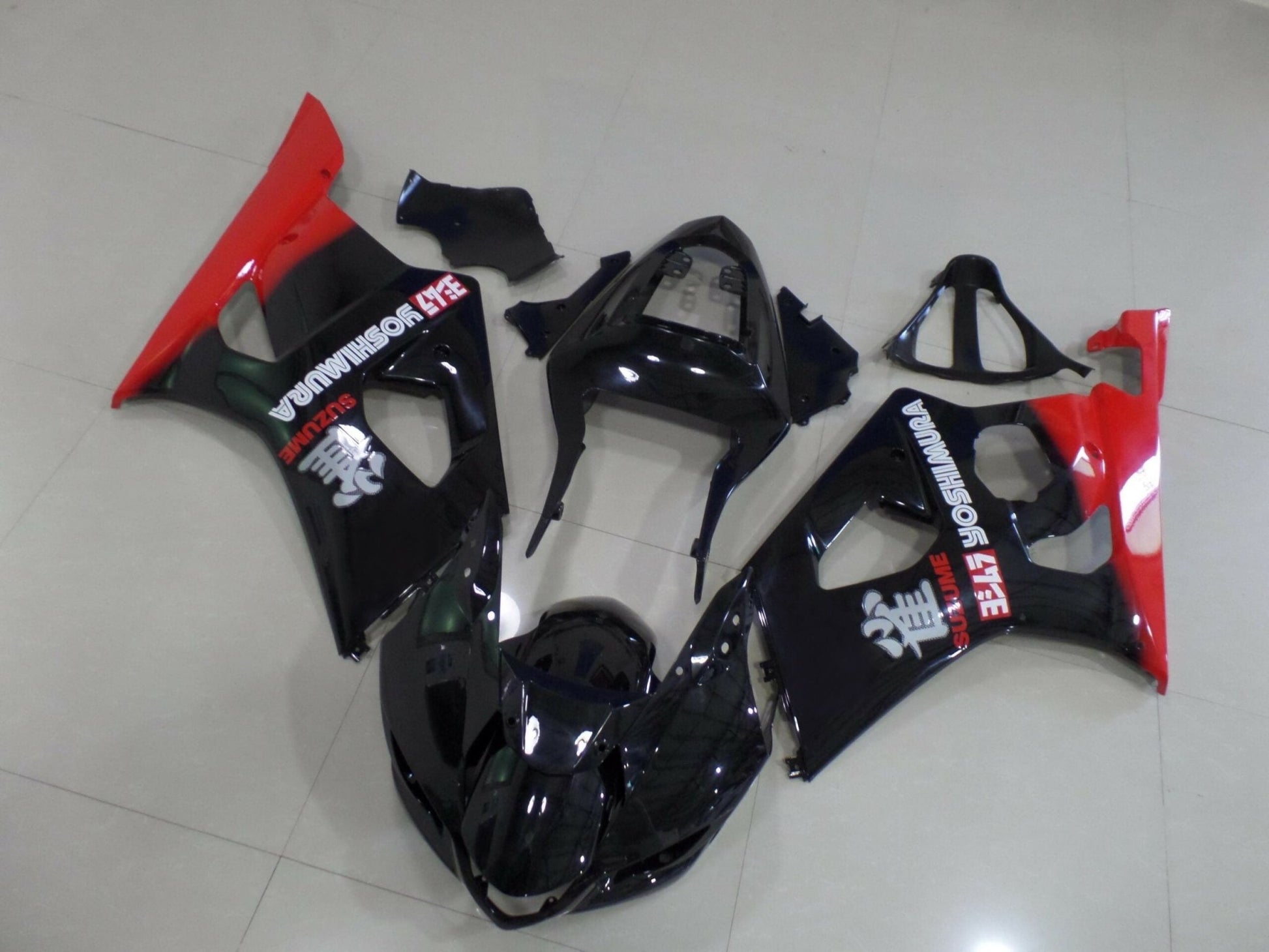 Black and Red Yoshimura Fairing Kit for a 2003 & 2004 Suzuki GSX-R1000 motorcycle