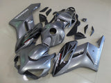 Silver, Black and White Fairing Kit for a 2004 and 2005 Honda CBR1000RR motorcycle