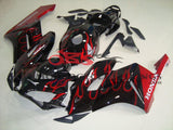 Black, Red and White Flame Fairing Kit for a 2004 & 2005 Honda CBR1000RR motorcycle.
