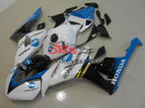 White, Black and Blue Konica Minolta Race Fairing Kit for a 2006 & 2007 Honda CBR1000RR motorcycle. This fairing kit is designed specifically for the racetrack,