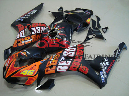 Matte Black and Orange ROSSI Fairing Kit for a 2006 & 2007 Honda CBR1000RR motorcycle