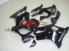 Gloss Black Fairing Kit for a 2001, 2002, 2003 Honda CBR600F4i motorcycle