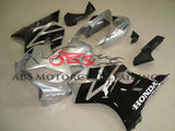 Silver, Black and White Fairing Kit for a 2004, 2005, 2006, 2007 Honda CBR600F4i motorcycle.