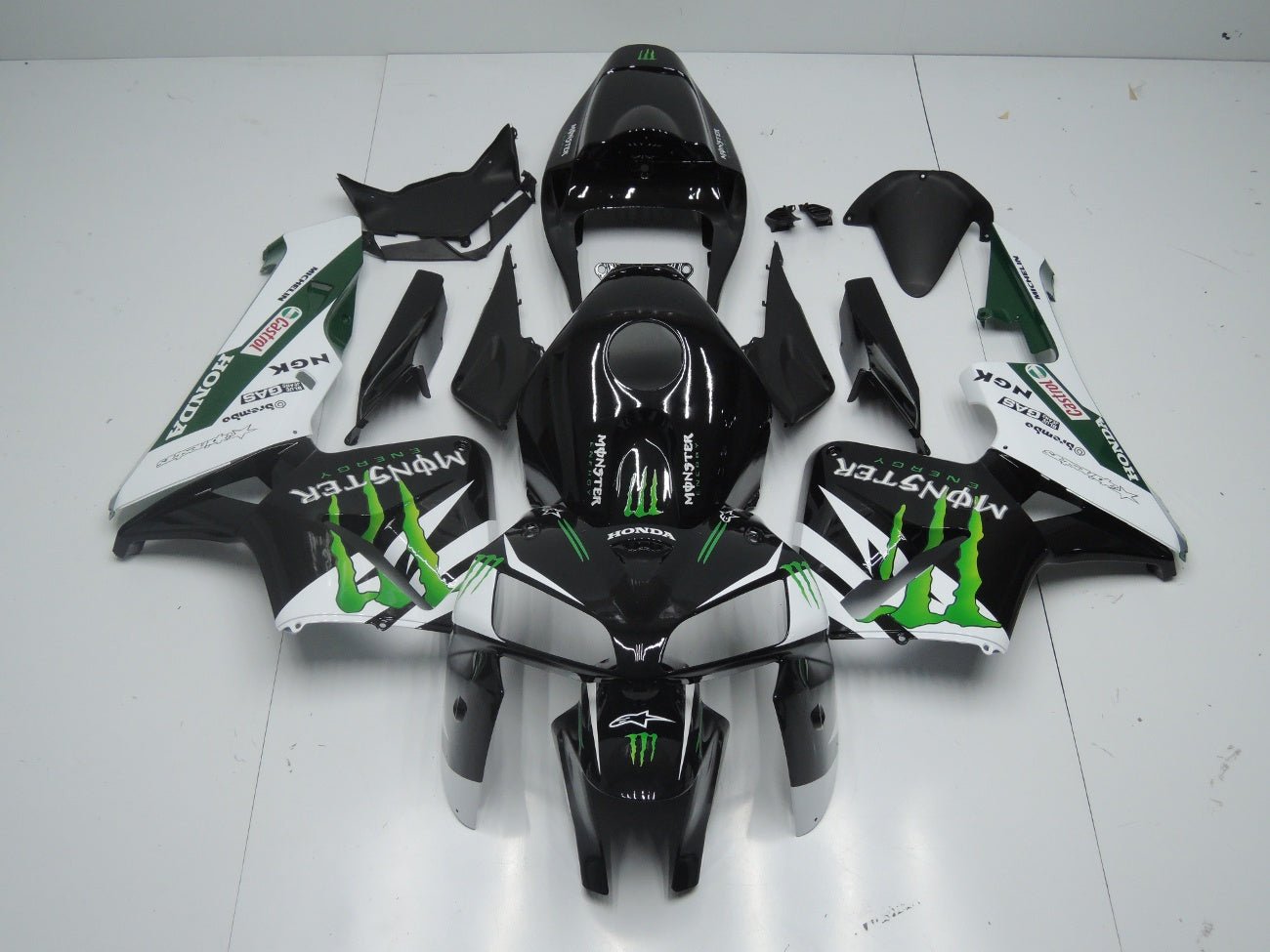 Black, White and Green Monster Fairing Kit for a 2005, 2006 Honda CBR600RR motorcycle.