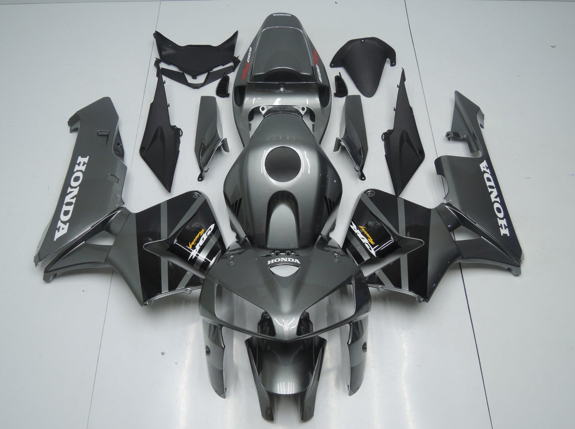 Dark Silver, Black and White Fairing Kit for a 2005 and 2006 Honda CBR600RR motorcycle