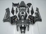 Dark Silver, Black and White Fairing Kit for a 2005 and 2006 Honda CBR600RR motorcycle