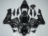 Black and Silver Flames Fairing Kit for a 2005 and 2006 Honda CBR600RR motorcycle.