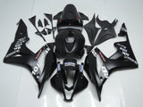 Matte Black, White and Red Repsol Fairing Kit for a 2007 and 2008 Honda CBR600RR motorcycle