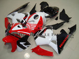 White, Red and Black Fairing Kit for a 2005, 2006 Honda CBR600RR motorcycle.