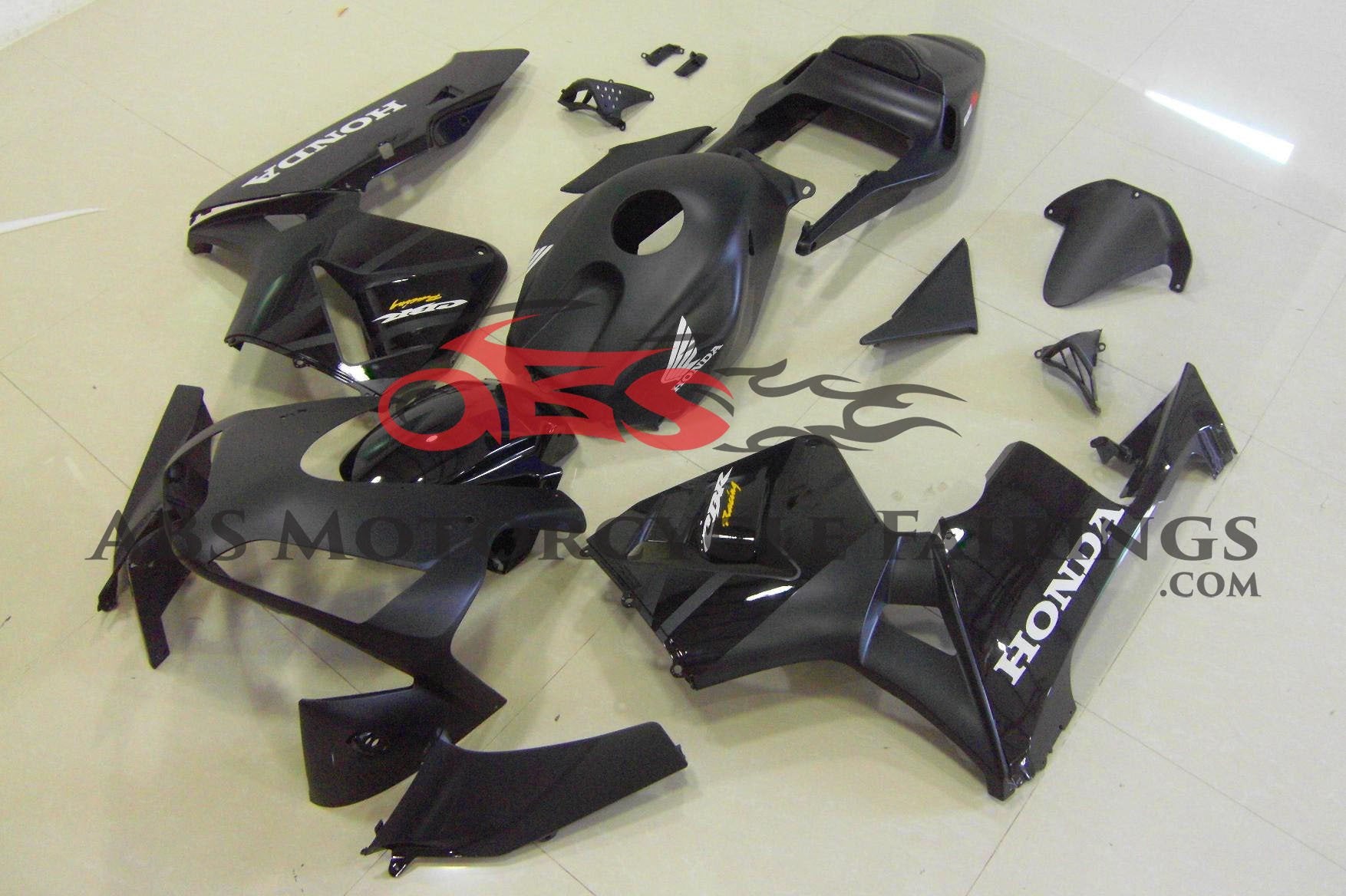 Matte Black with Gloss Black Fairing Kit for a 2003, 2004 Honda CBR600RR motorcycle