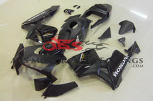 Matte Black with Gloss Black Fairing Kit for a 2003, 2004 Honda CBR600RR motorcycle