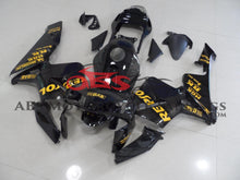 Black and Yellow REPSOL Fairing Kit for a 2003, 2004 Honda CBR600RR motorcycle