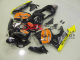Black and Orange HM Plant Racing Fairing Kit for a 2003, 2004 Honda CBR600RR motorcycle