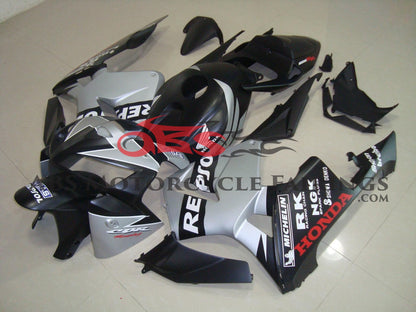 Matte Black and Silver Repsol Racing Fairing Kit for a 2005, 2006 Honda CBR600RR motorcycle