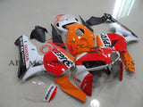 Orange, White and Red Repsol Racing Fairing Kit for a 2005, 2006 Honda CBR600RR motorcycle
