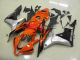 Orange, Black and Silver Fairing Kit for a 2007, 2008 Honda CBR600RR motorcycle