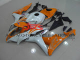 White and Orange Fairing Kit for a 2007, 2008 Honda CBR600RR motorcycle