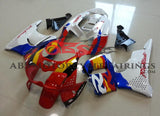 Red, White, Blue, Yellow and Black fairing kit for a Honda CBR900RR 1996-1997 motorcycle. Fairings for the Honda CBR900RR 1996-1997 motorcycle are Compressed Molded and modifications to the fairings may be required at time of installation
