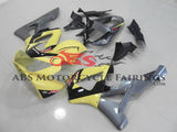 Yellow, Silver and Black Fairing Kit for a 2000 and 2001 Honda CBR900RR 929 motorcycle