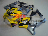 Yellow, Black and Silver Fairing Kit for a 2000 and 2001 Honda CBR900RR 929 motorcycle
