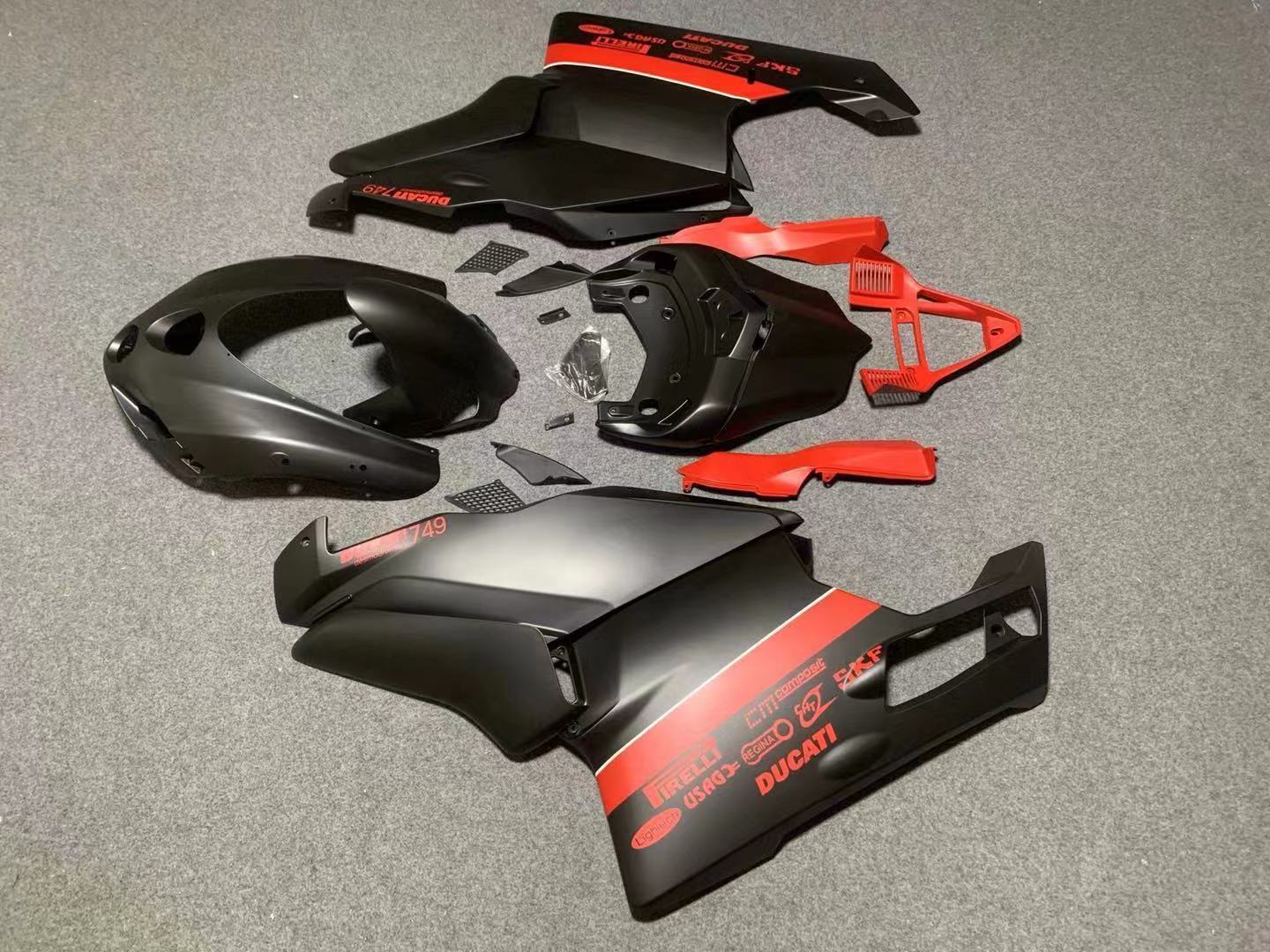 Matte Black and Red Fairing Kit for a 2003 & 2004 Ducati 999 motorcycle