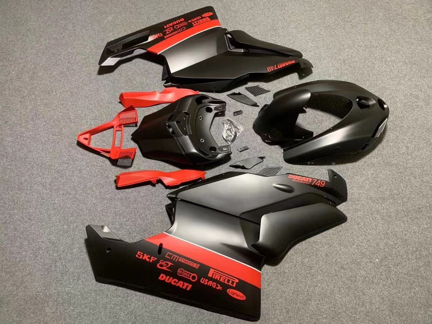 Matte Black and Red Fairing Kit for a 2003 & 2004 Ducati 999 motorcycle
