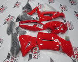 Red and Black fairing kit for a 2006, 2007 and 2008 Kawasaki Ninja 650R motorcycle. This is a compression molded fairing kit which will require modifications for proper fitment.