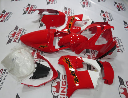 Red, White, Black and Orange fairing kit for a 2002 and 2003 Kawasaki ZX-9R motorcycle