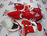 Red, White, Black and Orange fairing kit for a 2002 and 2003 Kawasaki ZX-9R motorcycle