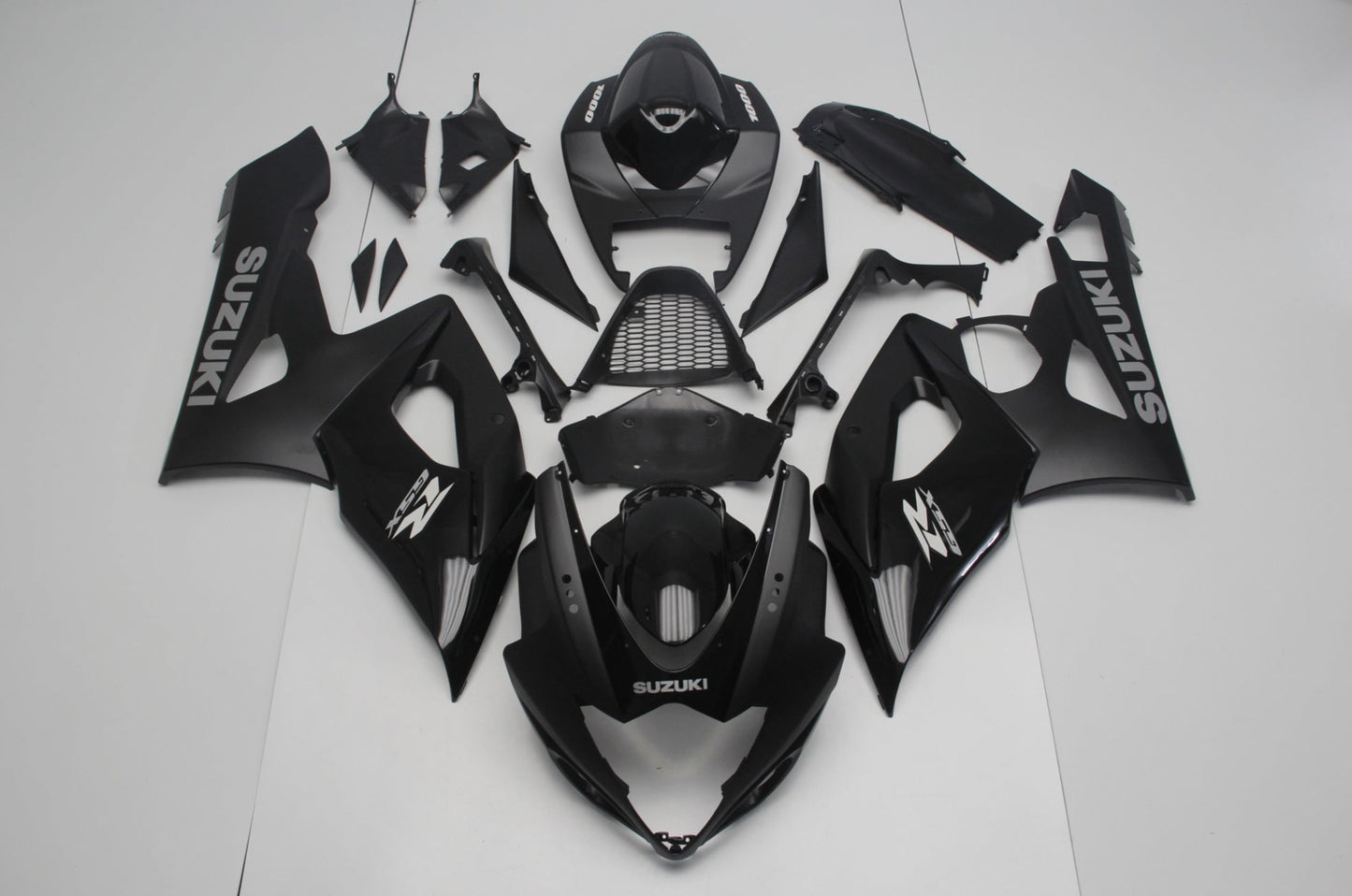 Matte Black, Gloss Black and Silver Fairing Kit for a 2005 & 2006 Suzuki GSX-R1000 motorcycle
