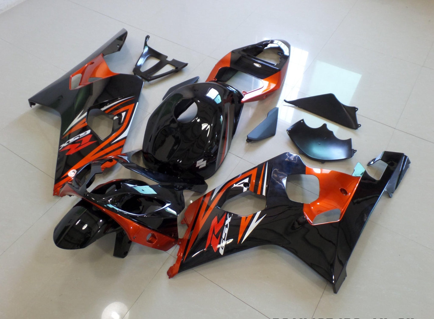 Black, Orange and Silver Fairing Kit for a 2004 & 2005 Suzuki GSX-R600 motorcycle