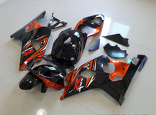 Black, Orange and Silver Fairing Kit for a 2004 & 2005 Suzuki GSX-R600 motorcycle