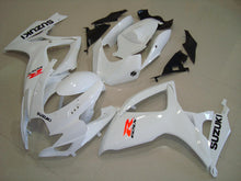 White, Black and Neon Orange Fairing Kit for a 2004 & 2005 Suzuki GSX-R600 motorcycle