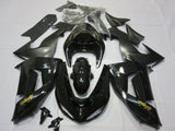 Black, Gold and Matte Black Fairing Kit for a 2006 & 2007 Kawasaki ZX-10R motorcycle.