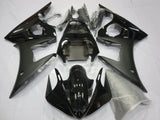 Gloss Black and Matte Black Fairing Kit for a 2003 & 2004 Yamaha YZF-R6 motorcycle