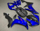 Blue, Faux Carbon Fiber and Matte Black Fairing Kit for a 2004, 2005 & 2006 Yamaha YZF-R1 motorcycle