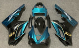 Teal Blue, Black, Yellow and White Fairing Kit for a 2009, 2010, 2011 & 2012 Triumph Daytona 675 motorcycle