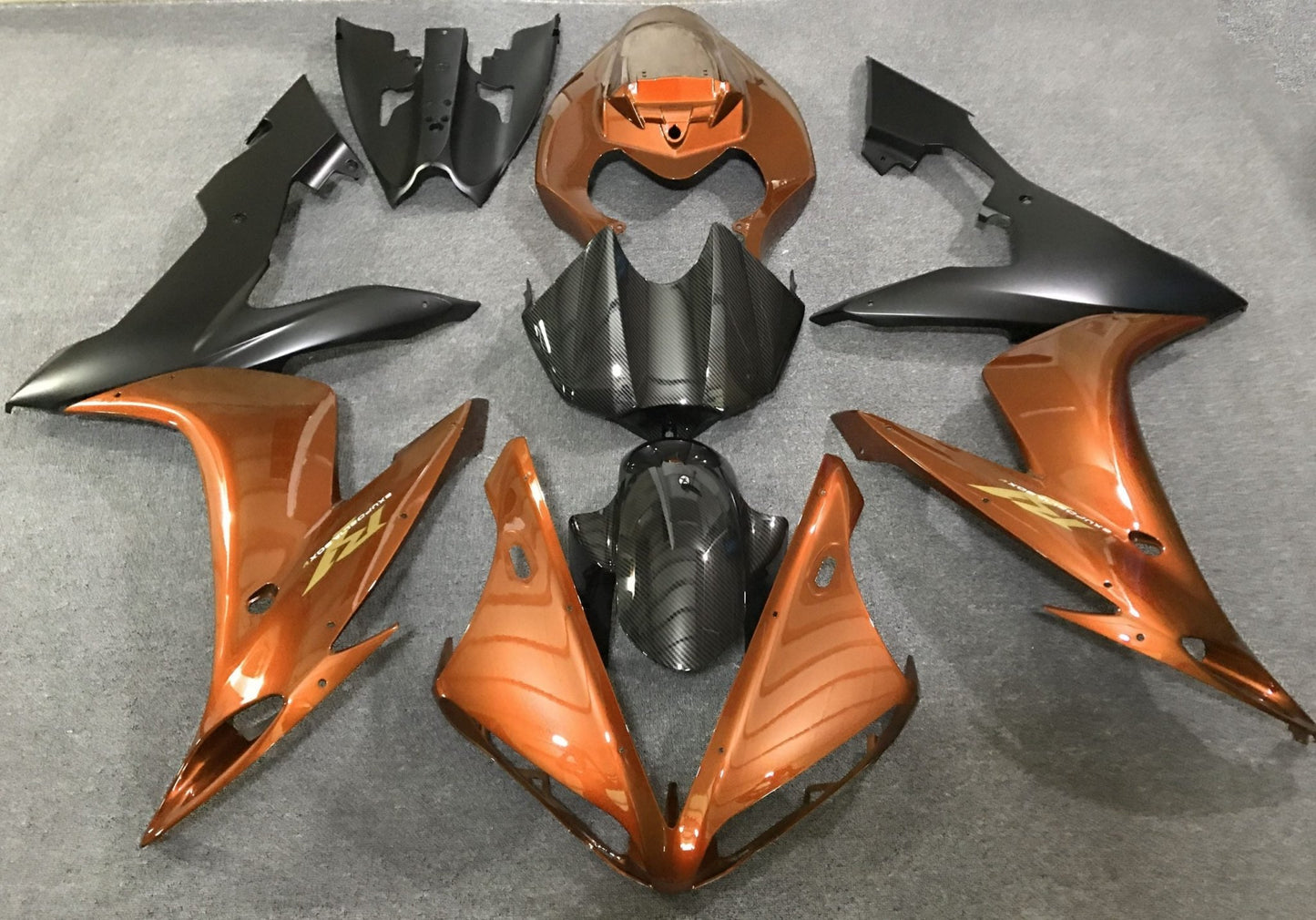 Orange, Faux Carbon Fiber and Matte Black Fairing Kit for a 2004, 2005 & 2006 Yamaha YZF-R1 motorcycle